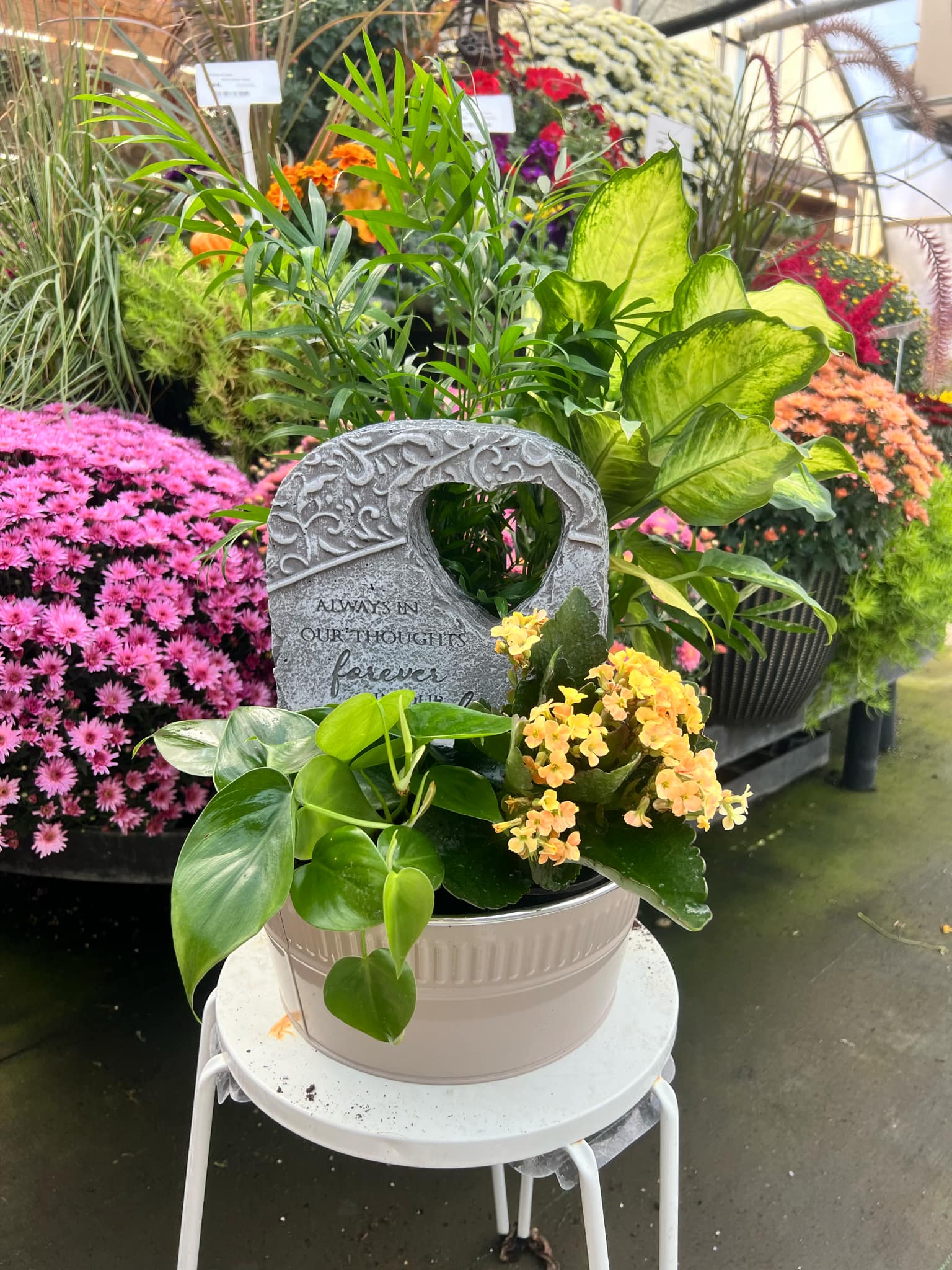 "Always in hearts, forever in our thoughts." stone & planter